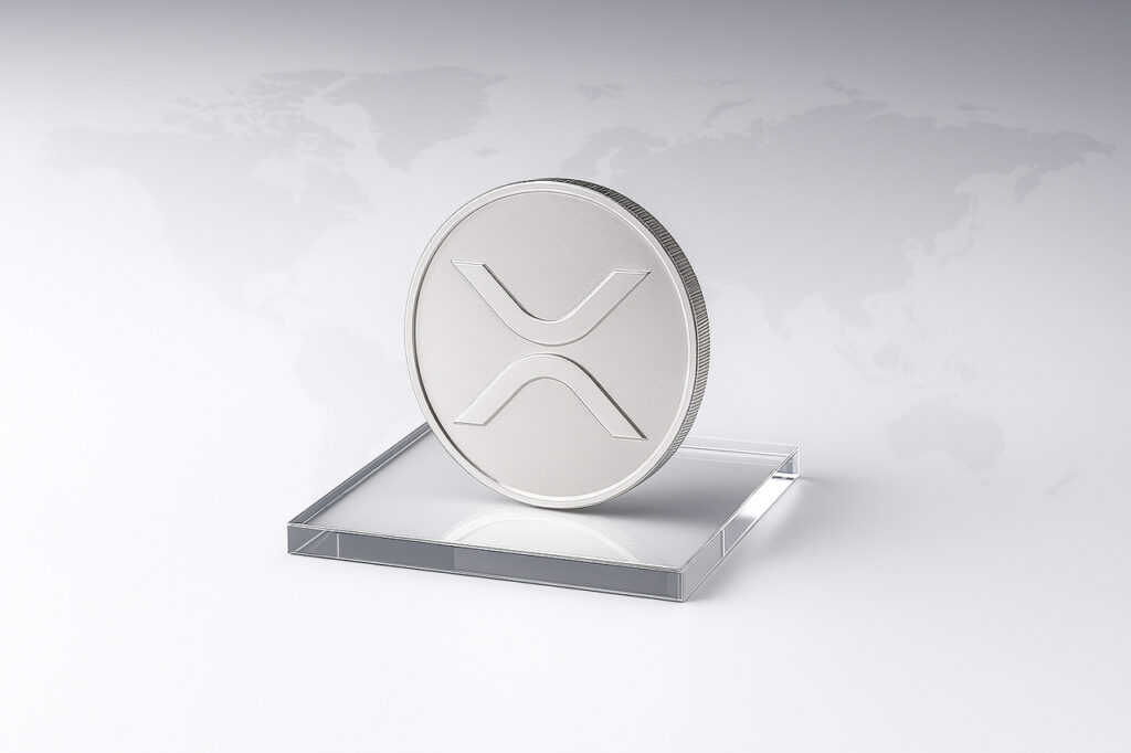 Moneta z logo XRP na szklanym podeście na tle mapy świata Złota moneta z logo XRP stoi na szklanym podeście na szarym tle reprezentuje jedną z dziesięciu pierwszych kryptowalut w Revolut