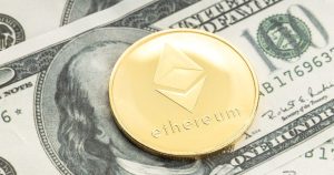 ethereum token on dollar bill