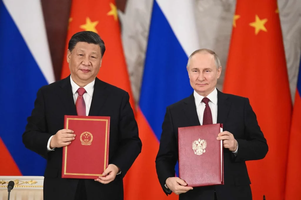 Владимир Путин (Русия) и Си Дзинпин (Китай)
